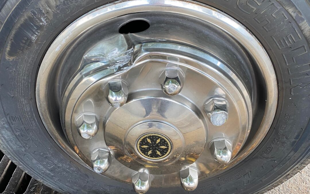 Pulled a little too close to the curb and dented my wheel. Is this